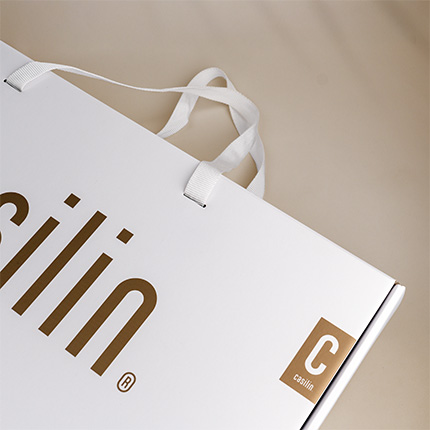 Pakuotė tekstilei su individualia spauda